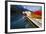 Glacier, Montana: Colorful Canoes Line the Dock at Many Glacier Lodge on Swiftcurrent Lake-Brad Beck-Framed Photographic Print