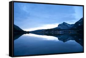 Glacier, Montana: Many Glacier Lodge Reflects Off of Swifcurrent Lake During Sunrise-Brad Beck-Framed Stretched Canvas