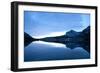 Glacier, Montana: Many Glacier Lodge Reflects Off of Swifcurrent Lake During Sunrise-Brad Beck-Framed Photographic Print