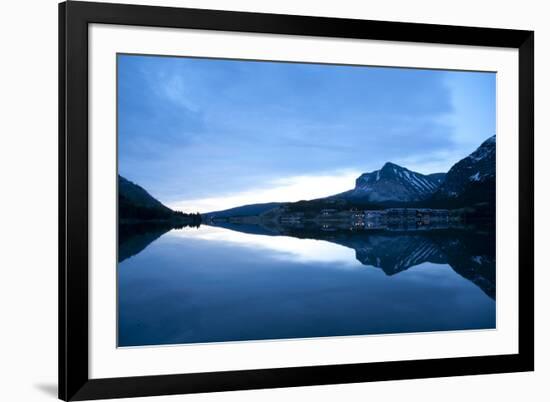 Glacier, Montana: Many Glacier Lodge Reflects Off of Swifcurrent Lake During Sunrise-Brad Beck-Framed Photographic Print