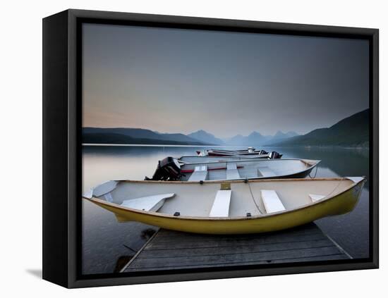 Glacier National Park- Boats Rest on a Dock in Front of Lake Mcdonald.-Ian Shive-Framed Stretched Canvas