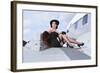 Glamorous Woman in 1940's Style Attire Sitting on a Vintage Aircraft-null-Framed Photographic Print