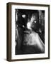 Glass Blower Heating Up Molten Glass Prior to Blowing a Glass Piece at Corning Glass Plant-Margaret Bourke-White-Framed Photographic Print