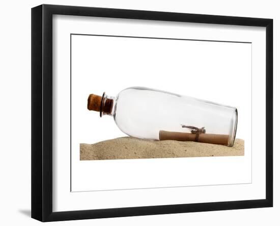 Glass Bottle With Note On Sand-null-Framed Art Print
