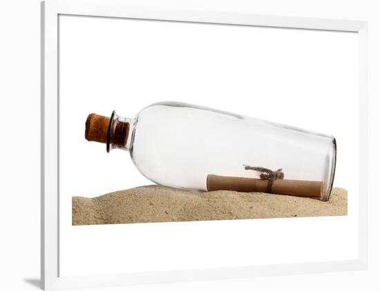 Glass Bottle With Note On Sand-null-Framed Art Print