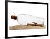 Glass Bottle With Note On Sand-null-Framed Art Print