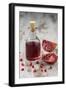 Glass Bottle with Pomegranate Juice and Pomegranate-Jana Ihle-Framed Photographic Print