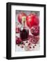 Glass Bottle with Pomegranate Juice and Pomegranates-Jana Ihle-Framed Photographic Print