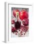 Glass Bottle with Pomegranate Juice and Pomegranates-Jana Ihle-Framed Photographic Print