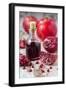 Glass Bottle with Pomegranate Juice and Pomegranates-Jana Ihle-Framed Photographic Print