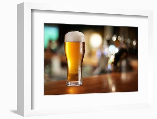 Glass of Light Beer on a Dark Pub.-Volff-Framed Photographic Print