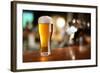 Glass of Light Beer on a Dark Pub.-Volff-Framed Photographic Print