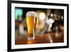 Glass of Light Beer on a Dark Pub.-Volff-Framed Photographic Print