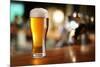 Glass of Light Beer on a Dark Pub.-Volff-Mounted Photographic Print