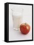 Glass of Milk and Red Apple-Roger Stowell-Framed Stretched Canvas