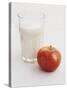 Glass of Milk and Red Apple-Roger Stowell-Stretched Canvas