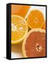 Glass of Orange Juice, Grapefruit and Oranges-null-Framed Stretched Canvas