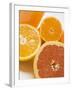 Glass of Orange Juice, Grapefruit and Oranges-null-Framed Photographic Print