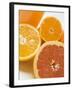 Glass of Orange Juice, Grapefruit and Oranges-null-Framed Photographic Print