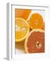 Glass of Orange Juice, Grapefruit and Oranges-null-Framed Photographic Print