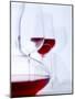 Glass of Red Wine, Carafe and Empty Wine Glasses-null-Mounted Photographic Print