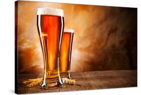 Glasses of Beer on Wooden Table-Jag_cz-Stretched Canvas