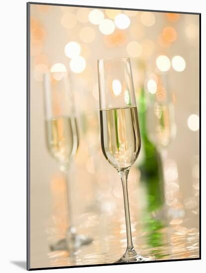 Glasses of Sparkling Wine with Twinkling Lights-Brigitte Protzel-Mounted Photographic Print