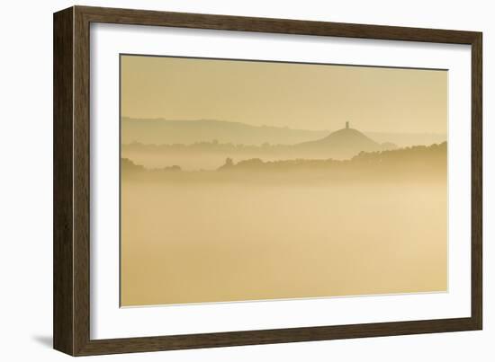 Glastonbury Tor and surrounding hills rising above early morning mist, Glastonbury, Somerset-Stuart Black-Framed Photographic Print