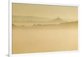 Glastonbury Tor and surrounding hills rising above early morning mist, Glastonbury, Somerset-Stuart Black-Framed Photographic Print