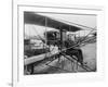 Glenn Martin Delivering Newspapers in His Airplane, 1911-null-Framed Photo