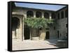 Glimpse of Courtyard with Miraculous Vineyard-null-Framed Stretched Canvas