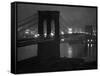 Glittering Night View of the Brooklyn Bridge Spanning the Glassy Waters of the East River-Andreas Feininger-Framed Stretched Canvas