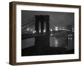 Glittering Night View of the Brooklyn Bridge Spanning the Glassy Waters of the East River-Andreas Feininger-Framed Photographic Print