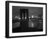 Glittering Night View of the Brooklyn Bridge Spanning the Glassy Waters of the East River-Andreas Feininger-Framed Photographic Print