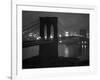 Glittering Night View of the Brooklyn Bridge Spanning the Glassy Waters of the East River-Andreas Feininger-Framed Photographic Print