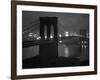 Glittering Night View of the Brooklyn Bridge Spanning the Glassy Waters of the East River-Andreas Feininger-Framed Photographic Print