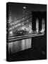 Glittering Night View of the Brooklyn Bridge Spanning the Glassy Waters of the East River-Andreas Feininger-Stretched Canvas