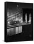 Glittering Night View of the Brooklyn Bridge Spanning the Glassy Waters of the East River-Andreas Feininger-Framed Stretched Canvas