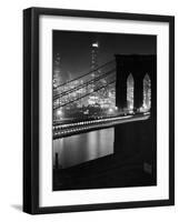 Glittering Night View of the Brooklyn Bridge Spanning the Glassy Waters of the East River-Andreas Feininger-Framed Premium Photographic Print