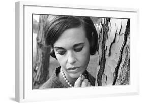 Gloria Vanderbilt Smoking Outside and Showing New Hairdo, 1963-Paul Schutzer-Framed Photographic Print