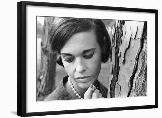 Gloria Vanderbilt Smoking Outside and Showing New Hairdo, 1963-Paul Schutzer-Framed Photographic Print