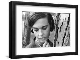 Gloria Vanderbilt Smoking Outside and Showing New Hairdo, 1963-Paul Schutzer-Framed Photographic Print