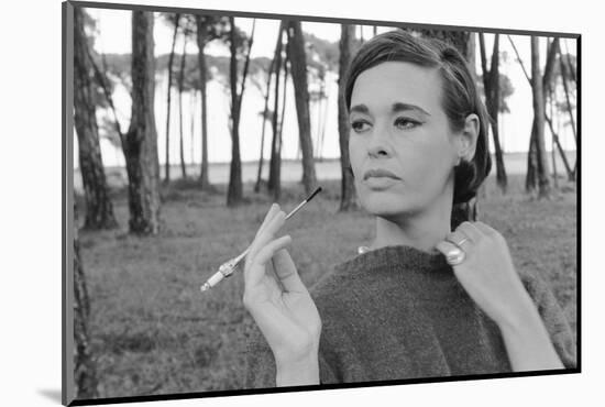 Gloria Vanderbilt Smoking Outside and Showing New Hairdo, 1963-Paul Schutzer-Mounted Photographic Print