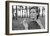 Gloria Vanderbilt Smoking Outside and Showing New Hairdo, 1963-Paul Schutzer-Framed Premium Photographic Print