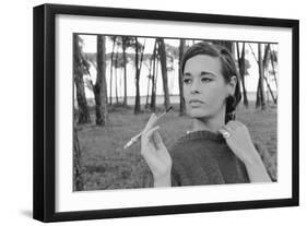 Gloria Vanderbilt Smoking Outside and Showing New Hairdo, 1963-Paul Schutzer-Framed Premium Photographic Print