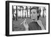 Gloria Vanderbilt Smoking Outside and Showing New Hairdo, 1963-Paul Schutzer-Framed Premium Photographic Print