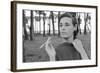 Gloria Vanderbilt Smoking Outside and Showing New Hairdo, 1963-Paul Schutzer-Framed Photographic Print