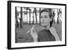 Gloria Vanderbilt Smoking Outside and Showing New Hairdo, 1963-Paul Schutzer-Framed Photographic Print