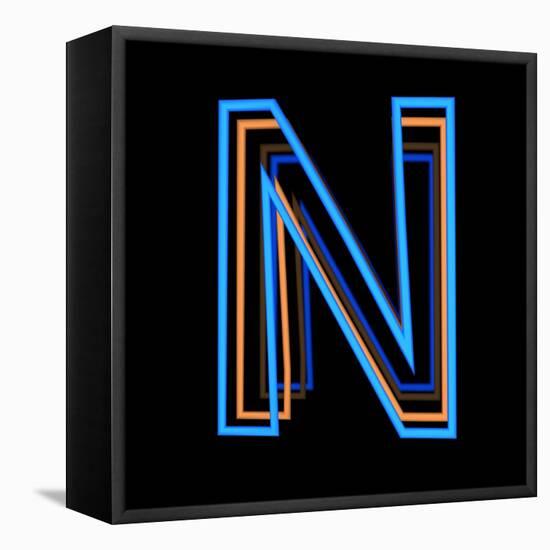Glowing Letter N Isolated On Black Background-Andriy Zholudyev-Framed Stretched Canvas