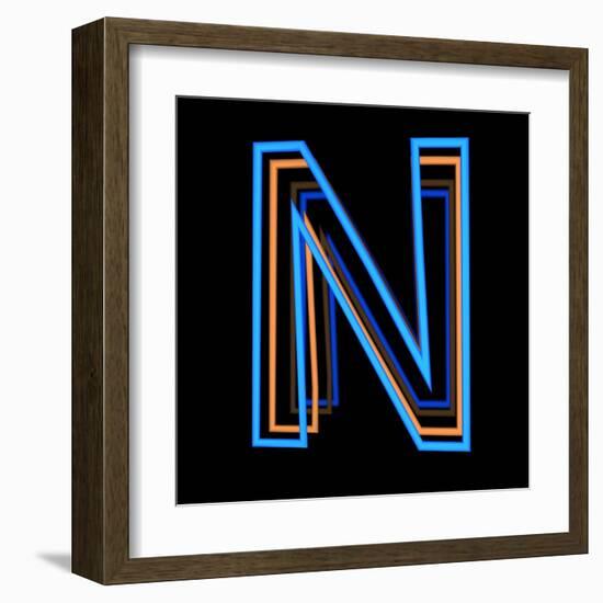 Glowing Letter N Isolated On Black Background-Andriy Zholudyev-Framed Art Print